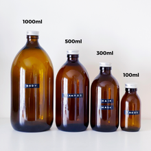 Load image into Gallery viewer, Amber Glass Or Plastic Bottle With Stamped Label & Silver Metal Screw Lid
