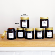 Load image into Gallery viewer, Set Of 7 Mini Amber Glass Jars With Gold Lids And White Labels