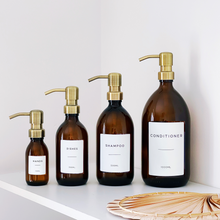 Load image into Gallery viewer, Amber Glass Or Plastic Dispenser Bottle With Personalised Label & Light Brushed Gold Metal Pump