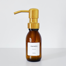 Load image into Gallery viewer, Amber Glass Or Plastic Dispenser Bottle With Personalised Label & Gold Metal Pump