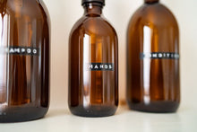 Load image into Gallery viewer, Amber Glass Or Plastic Dispenser Bottle With Stamped Personalised Label And Gold Metal Pump