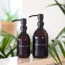 Load image into Gallery viewer, Amber Glass Or Plastic Dispenser Bottle With Stamped Personalised Label And Black Metal Pump