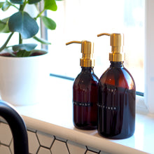 Load image into Gallery viewer, Amber Glass Or Plastic Dispenser Bottle With Stamped Personalised Label And Gold Metal Pump