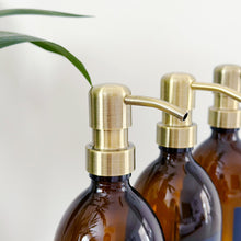Load image into Gallery viewer, Set Of 3 Amber Bottles - Glass Or Plastic - Dark Blue Labels - Brushed Gold Metal Pumps