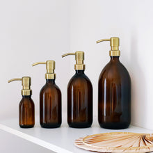 Load image into Gallery viewer, Amber Glass Or Plastic Dispenser Bottle With Light Brushed Gold Metal Pump