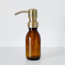 Load image into Gallery viewer, Amber Glass Or Plastic Dispenser Bottle With Light Brushed Gold Metal Pump