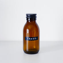 Load image into Gallery viewer, Amber Glass Or Plastic Bottle With Stamped Label & Black Metal Screw Lid