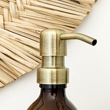 Load image into Gallery viewer, Amber Glass Or Plastic Dispenser Bottle With Stamped Personalised Label And Light Brushed Gold Metal Pump