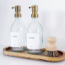 Load image into Gallery viewer, Set Of 2 Clear Bottles - Glass Or Plastic - Hands & Dishes - Brushed Light Gold Metal Pumps