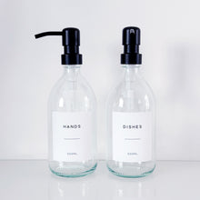 Load image into Gallery viewer, Set Of 2 Clear Bottles - Glass Or Plastic - Hands & Dishes - Black Metal Pumps