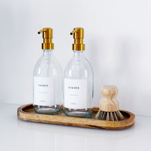 Load image into Gallery viewer, Set Of 2 Clear Bottles - Glass Or Plastic - Hands & Dishes - Gold Metal Pumps