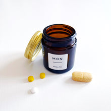 Load image into Gallery viewer, Set Of 7 Mini Amber Glass Jars With Gold Lids And White Labels