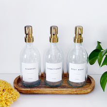 Load image into Gallery viewer, Set Of 3 Clear Bottles - Glass Or Plastic - Shampoo, Conditioner & Body Wash - Brushed Light Gold Metal Pumps