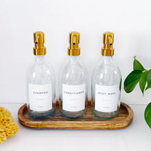 Load image into Gallery viewer, Set Of 3 Clear Bottles - Glass Or Plastic - Shampoo, Conditioner & Body Wash - Gold Metal Pumps (Copy)