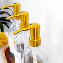 Load image into Gallery viewer, Set Of 3 Clear Bottles - Glass Or Plastic - Shampoo, Conditioner & Body Wash - Gold Metal Pumps (Copy)