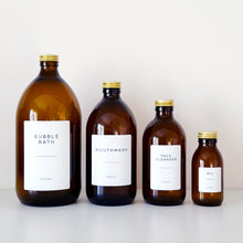Load image into Gallery viewer, Amber Glass Or Plastic Bottle With White Label & Gold Metal Screw Lid