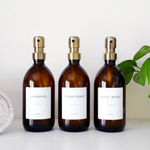Load image into Gallery viewer, Set Of 3 Amber Bottles - Glass Or Plastic - Shampoo, Conditioner & Body Wash - Brushed Gold Metal Pumps