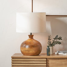 Load image into Gallery viewer, Kiah round dark mango wood table lamp base with white linen fabric drum shade. Perfect for a minimalist interior.