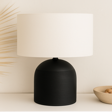 Load image into Gallery viewer, Nelu black mango wood table lamp base with a white linen shade. Perfect for a stylish minimalist aesthetic.