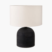 Load image into Gallery viewer, Nelu black mango wood table lamp base with a white linen shade.