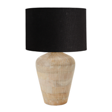 Load image into Gallery viewer, Taika white washed ribbed wood table lamp base with a black linen fabric drum lamp shade. Ideal for a Mediterranean inspired home interior.