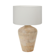 Load image into Gallery viewer, Taika white washed ribbed wood table lamp base with a white linen fabric drum lamp shade. Ideal for a Mediterranean inspired home interior.