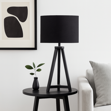 Load image into Gallery viewer, Whitby matt black tapered leg table lamp with a black linen shade. Perfect for a stylish monochrome home.