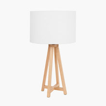 Load image into Gallery viewer, Whitby natural tapered table lamp base with a white linen shade on a bedside table.