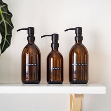 Load image into Gallery viewer, Amber Glass Or Plastic Dispenser Bottle With Stamped Personalised Label And Black Metal Pump