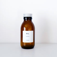 Load image into Gallery viewer, Amber Glass Or Plastic Bottle With White Label &amp; Silver Metal Screw Lid
