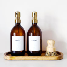 Load image into Gallery viewer, Set Of 2 Amber Bottles - Glass Or Plastic - Hands &amp; Dishes - Brushed Light Gold Metal Pumps

