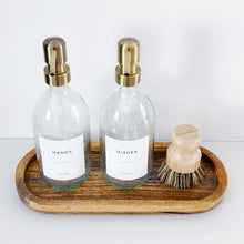Load image into Gallery viewer, Set Of 2 Clear Bottles - Glass Or Plastic - Hands &amp; Dishes - Brushed Light Gold Metal Pumps
