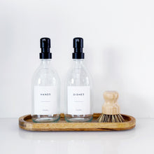 Load image into Gallery viewer, Set Of 2 Clear Bottles - Glass Or Plastic - Hands &amp; Dishes - Black Metal Pumps
