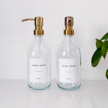 Load image into Gallery viewer, Set Of 2 Clear Bottles - Glass Or Plastic - Hand Soap &amp; Dish Soap - Brushed Light Gold Metal Pumps
