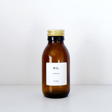 Load image into Gallery viewer, Amber Glass Or Plastic Bottle With White Label &amp; Gold Metal Screw Lid
