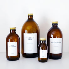Load image into Gallery viewer, Amber Glass Or Plastic Bottle With White Label &amp; Gold Metal Screw Lid
