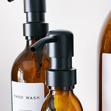 Load image into Gallery viewer, Amber Glass Or Plastic Dispenser Bottle With Personalised Label &amp; Black Metal Pump
