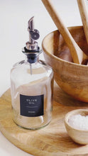 Load and play video in Gallery viewer, Clear Glass Oil / Vinegar Pourer Bottle With Black Label
