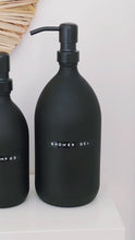 Load and play video in Gallery viewer, Matt Black Glass Dispenser Bottle With Stamped Personalised Label &amp; Black Metal Pump
