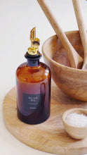 Load and play video in Gallery viewer, Amber Glass Oil / Vinegar Pourer Bottle With Black Label
