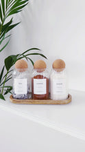 Load and play video in Gallery viewer, Set of 3 Cork Ball Ribbed Glass Jars - Tea, Coffee, Sugar
