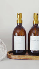 Load and play video in Gallery viewer, Set Of 3 Amber Bottles - Glass Or Plastic - Shampoo, Conditioner &amp; Body Wash - Gold Metal Pumps
