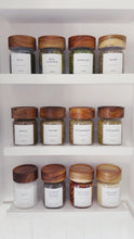 Load and play video in Gallery viewer, Personalised Glass Herb &amp; Spice Jars With Acacia Wood Screw Lid
