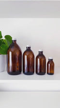 Load and play video in Gallery viewer, Amber Bottle With Silver Aluminium Screw Lid
