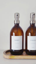 Load and play video in Gallery viewer, Set Of 2 Amber Bottles - Glass Or Plastic - Hands &amp; Dishes - Silver Metal Pumps
