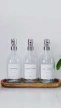 Load and play video in Gallery viewer, Set Of 3 Clear Bottles - Glass Or Plastic - Shampoo, Conditioner &amp; Body Wash - Silver Metal Pumps
