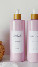 Load and play video in Gallery viewer, Pink Plastic Dispenser Bottle With White Personalised Label And Bamboo Pump

