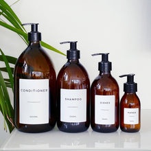 Load image into Gallery viewer, Amber glass dispenser bottles with white waterproof labels
